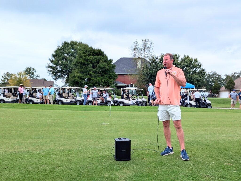 Matt Haley speaks to the crowd at the Sheriff’s Showdown 2024 at Windance Golf Clug