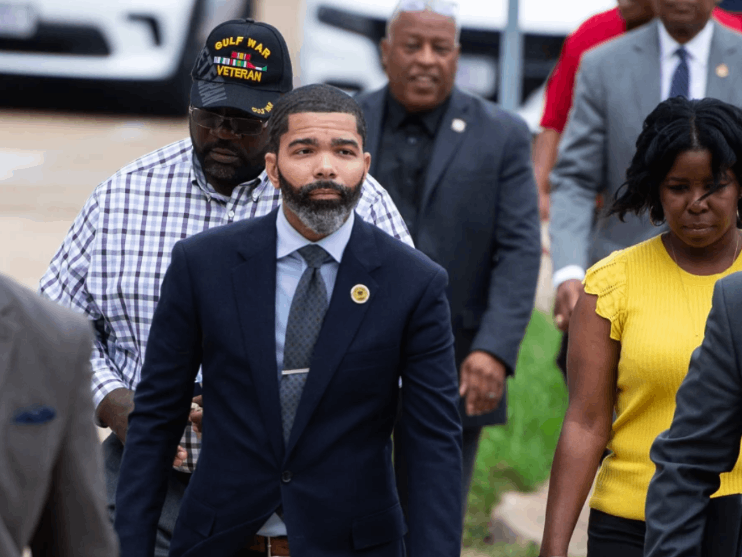 Mayor Chokwe Antar Lumumba, center, heads to federal court in Jackson after he was indicted on federal charges. Barbara Gauntt / The Clarion-Ledger / USA Today Network. This photo was found and used on the NBCNews.com website.