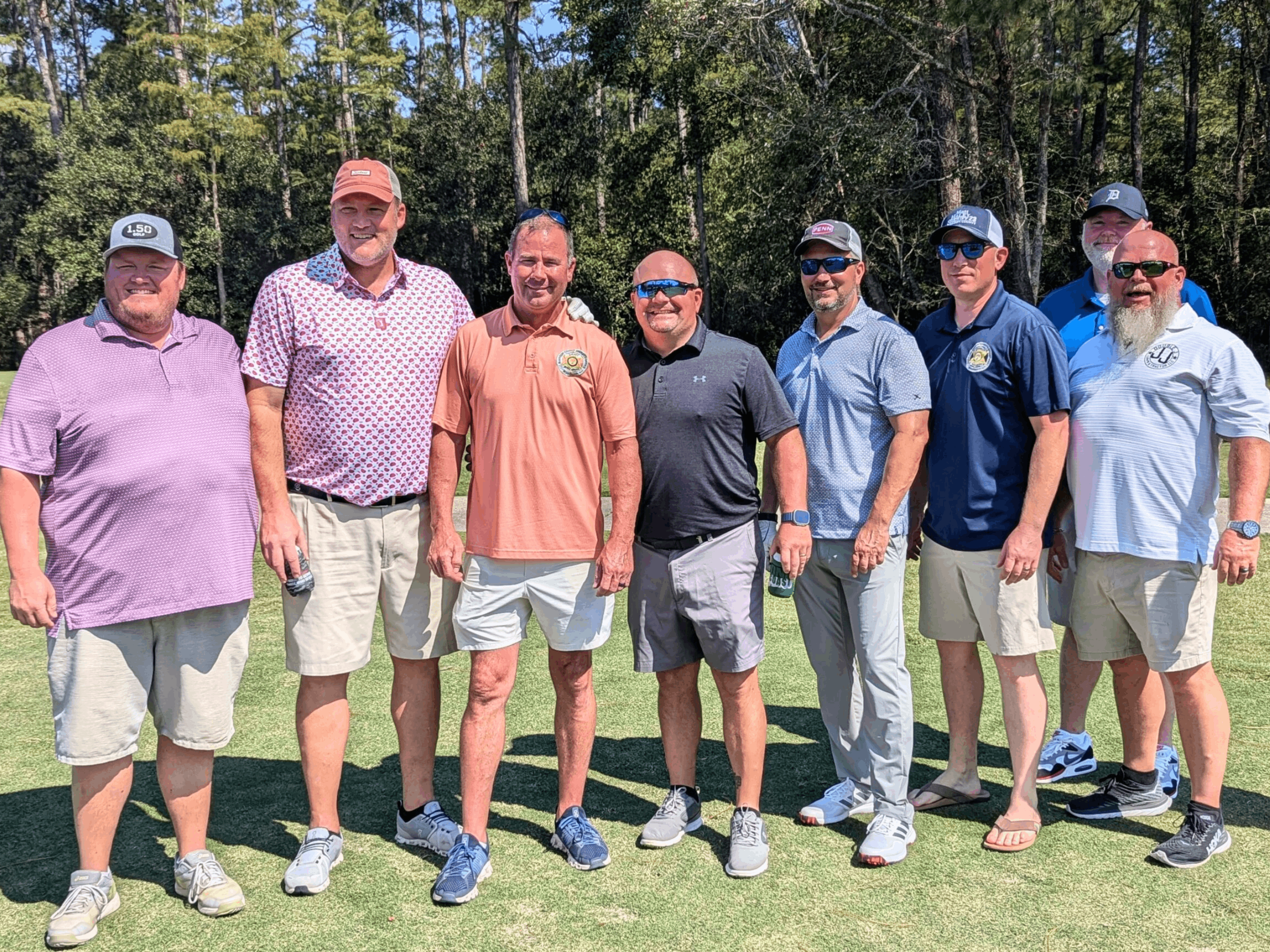 Harrison County Sheriff Matt Haley poses with a group of golfers at the 2024 Sheriffs Show Down at the Windance Golf Course in Gulfport, Mississippi.