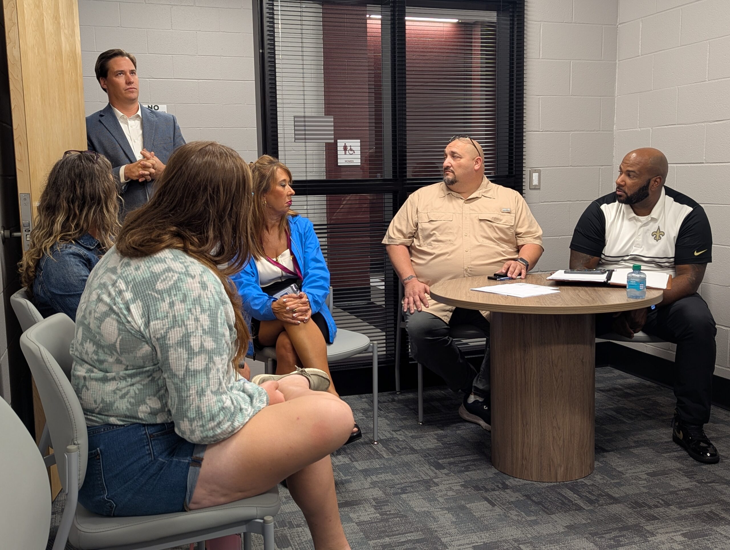 Patrick Bennett explains to Community Leader Michael McGill and regional business owners how Long Beach, MS CTE is helping build tomorrows work force.