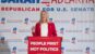 Sarah Adlakha stands at a podium to annocunce that she is running for Mississippi United States Senate